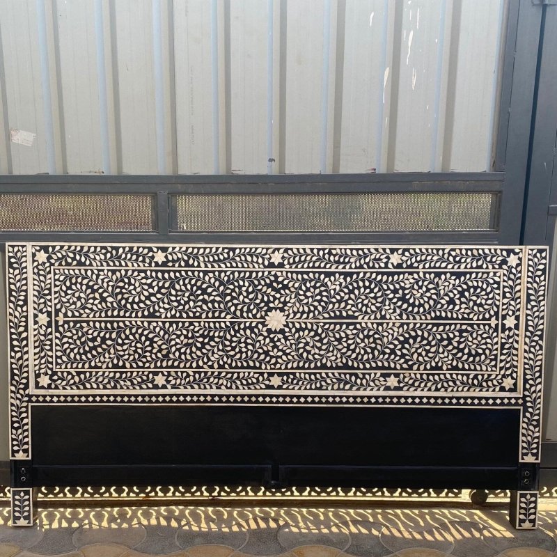 Black floral bone inlay wooden headboard with white hand-cut inlay detailing, artisan crafted bedroom decor piece