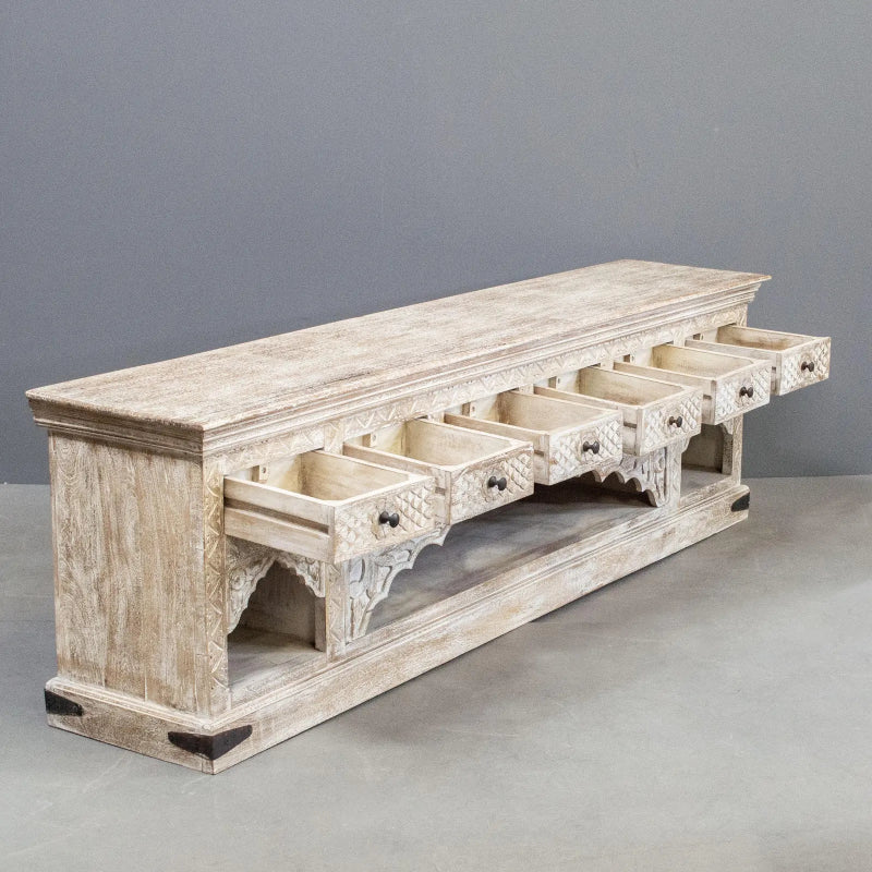 Carved drawer rustic credenza in solid wood, open drawer view showing six extended drawers above scalloped shelf arches.