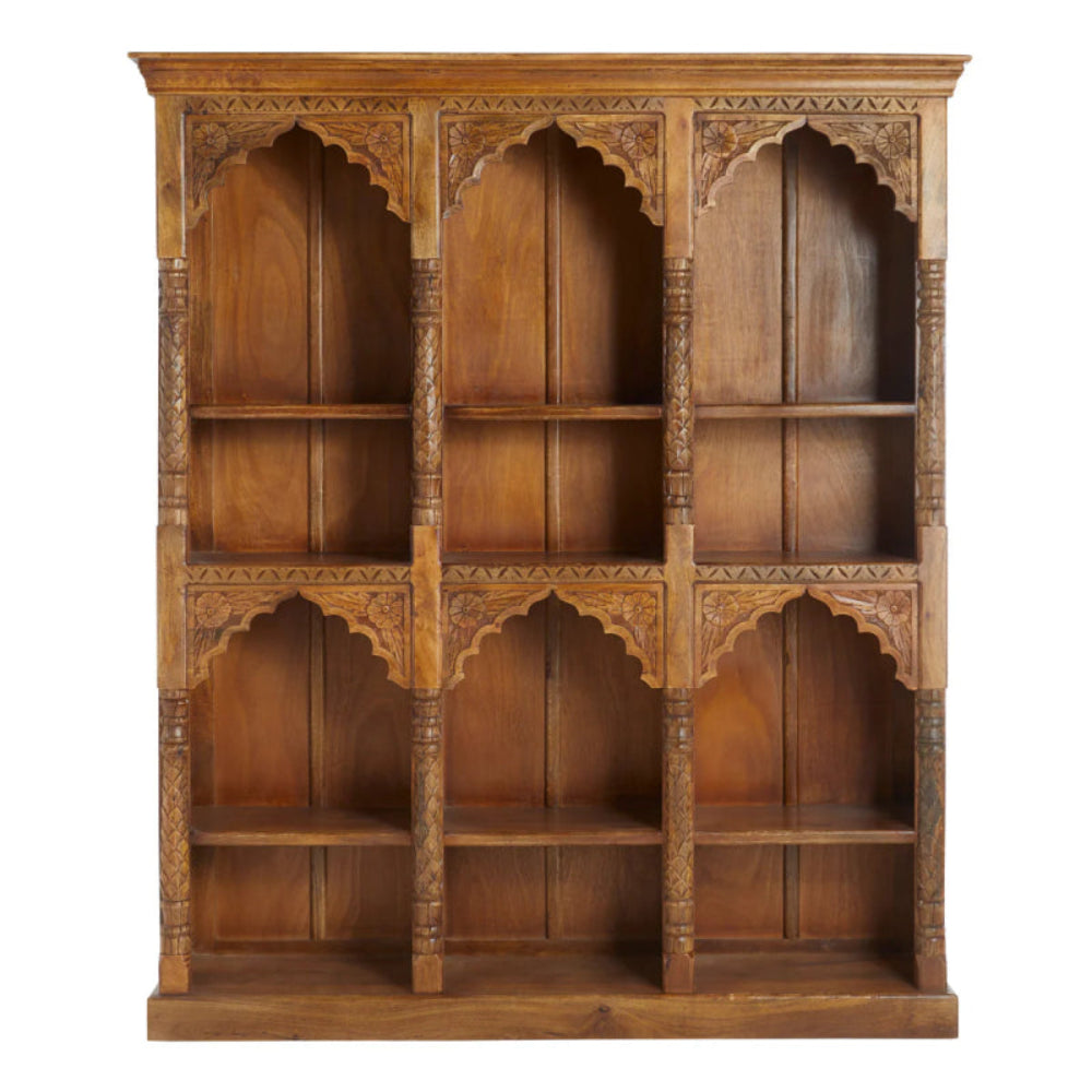 Carved wood display cabinet in warm brown, front view showing three shelf columns framed by floral arches and turned posts.
