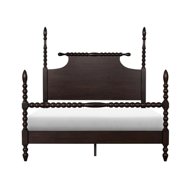 Handmade dark wood bed with four posts and spindle detailing.