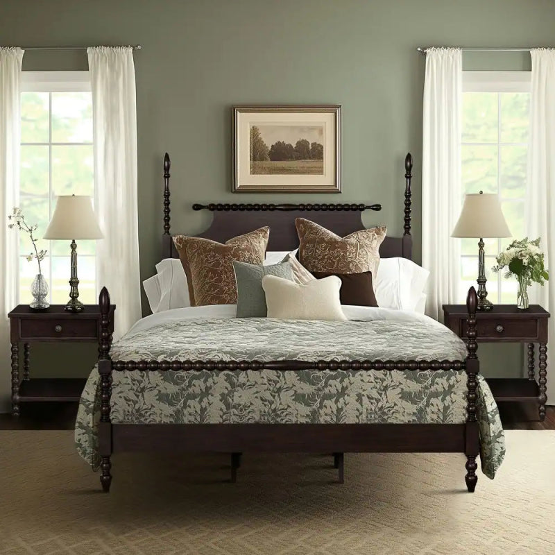 Coastal-style wooden bed with tall posts and a dark finish.