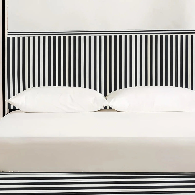 Detailed view of bone inlay striped headboard with two white pillows showing precise black white inlay craftsmanship