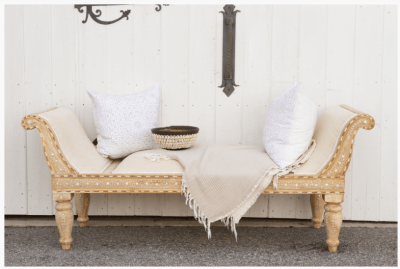 Traditional wood inlay teak chaise lounge in bleached teak with cream upholstery and turned legs – Anglo-Indian daybed