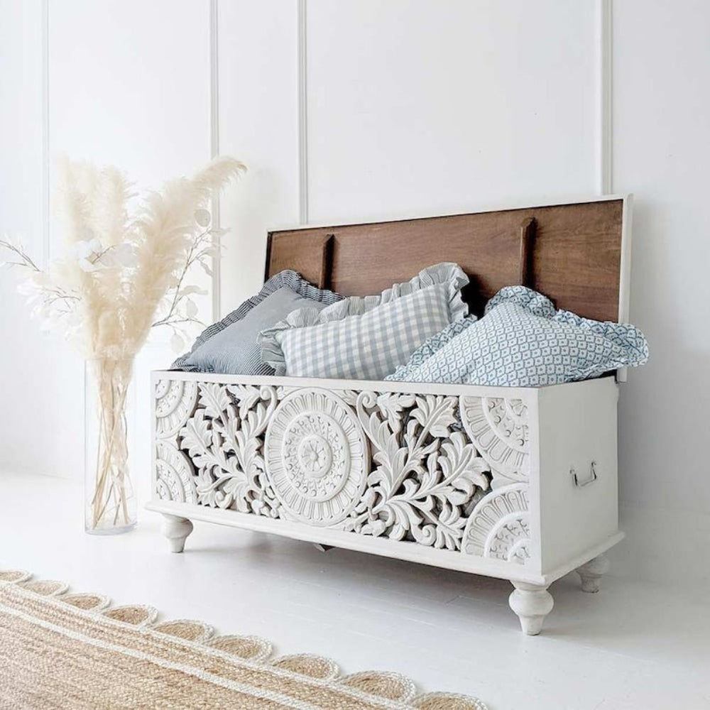Rectangular Botanical Hope Chest in white wood, angled front view with raised lid, stored cushions and a side handle.