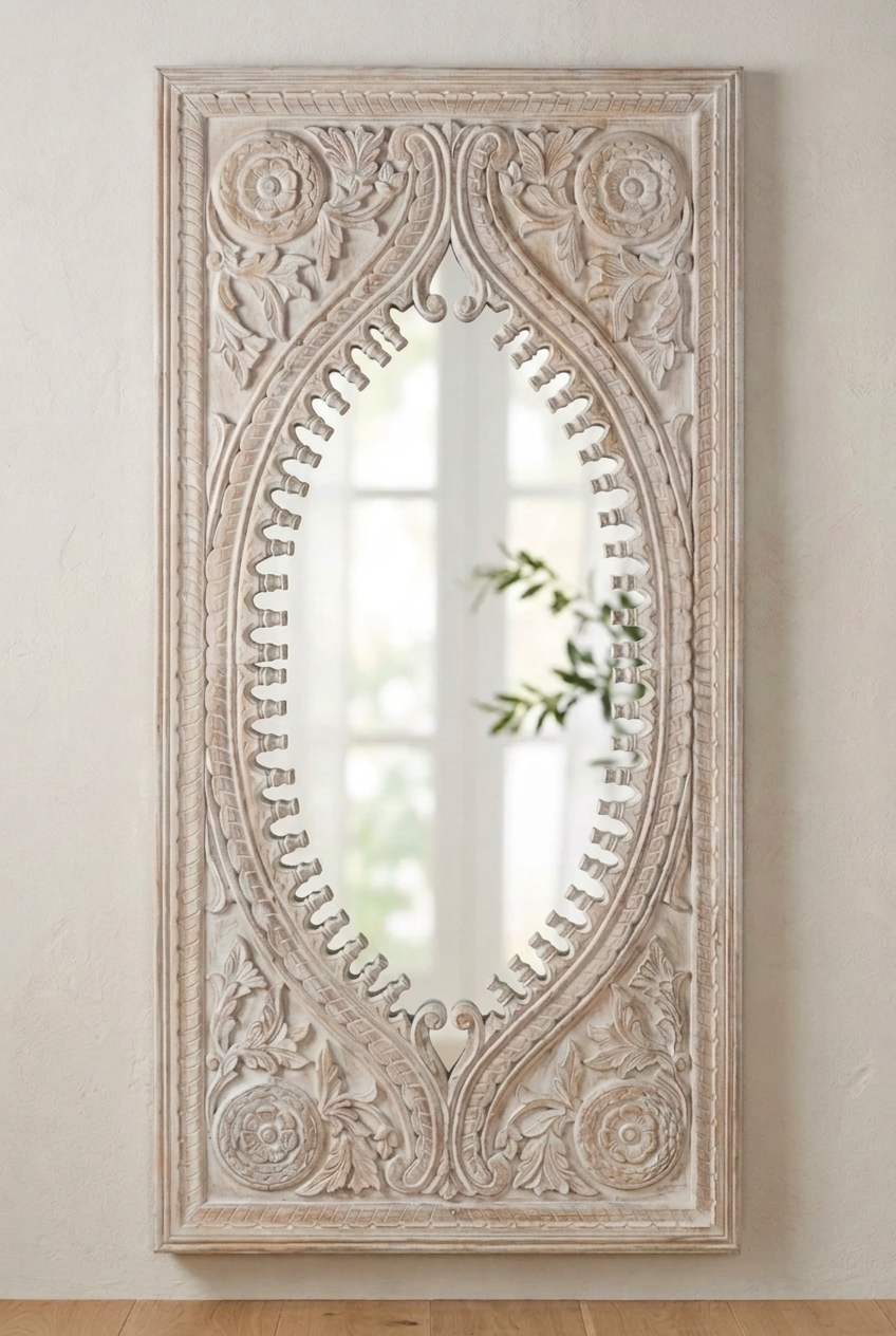 Rustic floral wall mirror in carved solid wood, front view with corner rosettes and a leafy branch reflected in glass.