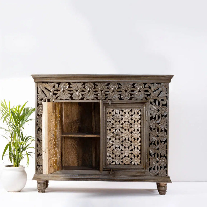 Solid wood storage cabinet in a natural finish, front view with the left door open, revealing a shelf and wood interior.