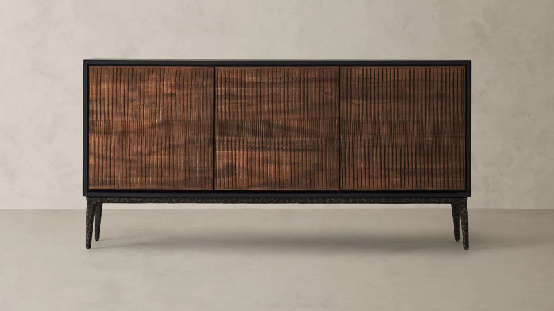 Handcrafted Phoenix sideboard combining warm brown wood, dark metal trim, and minimalist Scandinavian styling.