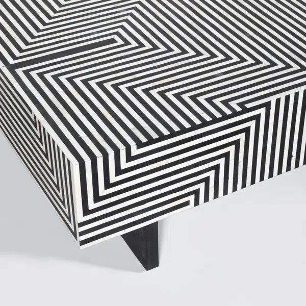 Detailed geometric stripe bone inlay pattern on handmade black and white rectangle coffee table, artisan crafted luxury home decor furniture