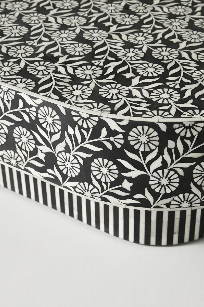 Handmade Bone Inlay Low Table in black and white, shown from a rear three-quarter view with the oval top and base visible.
