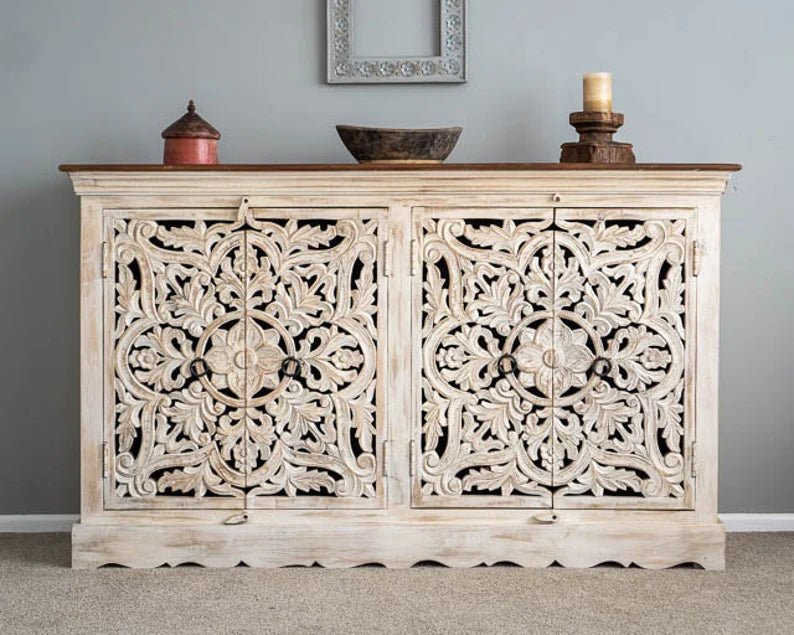 Scalloped base wooden sideboard in a rustic finish, front view showing four floral doors and dark ring pulls.