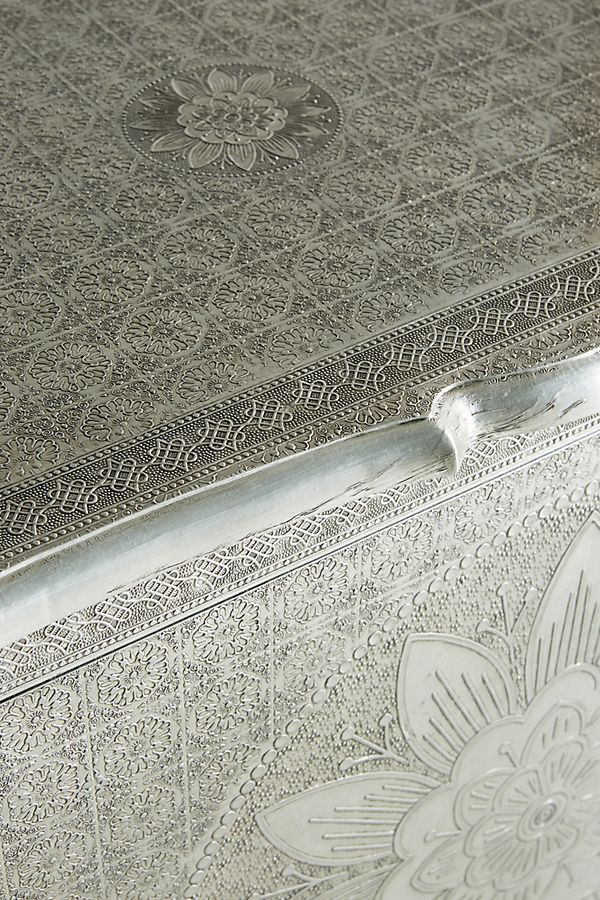 Hand embossed white metal buffet top