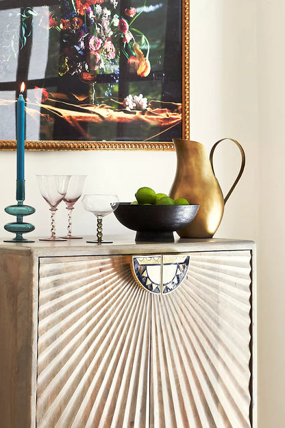 Wooden cabinet with carved details