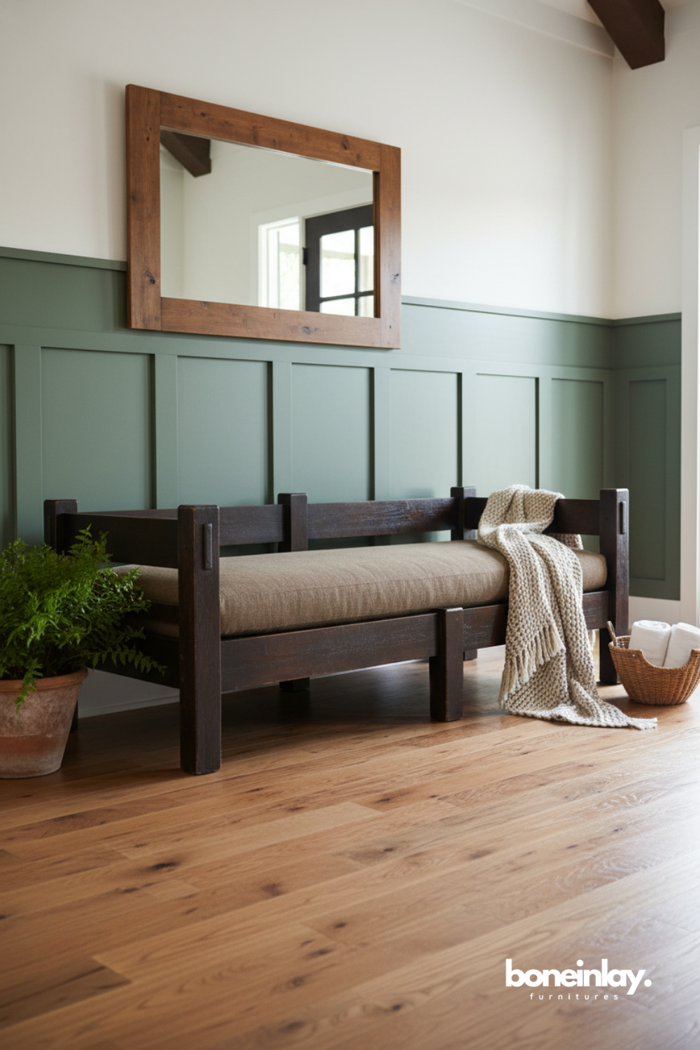 Solid wood entryway bench with upholstered seat in a modern farmhouse interior.