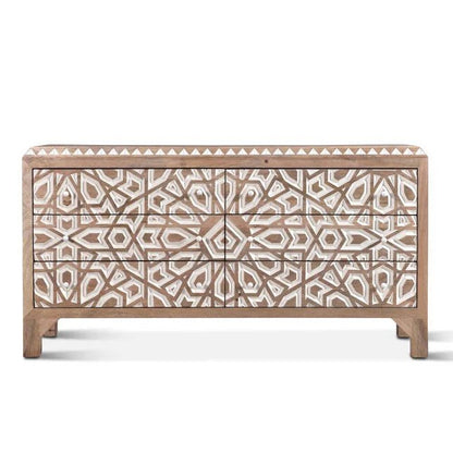 The Albaron solid wood 6-drawer dresser featuring a hand-carved geometric lattice and star pattern with a natural wood and white finish.