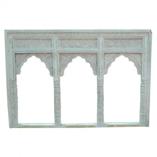 Hand-carved solid wood triple arch Indian Jharokha frame in distressed white wash finish with intricate floral carvings.