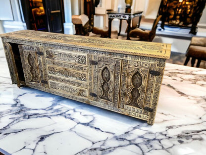 Arched door wooden server in rustic carved timber, elevated front view on veined flooring with dark door hinges.