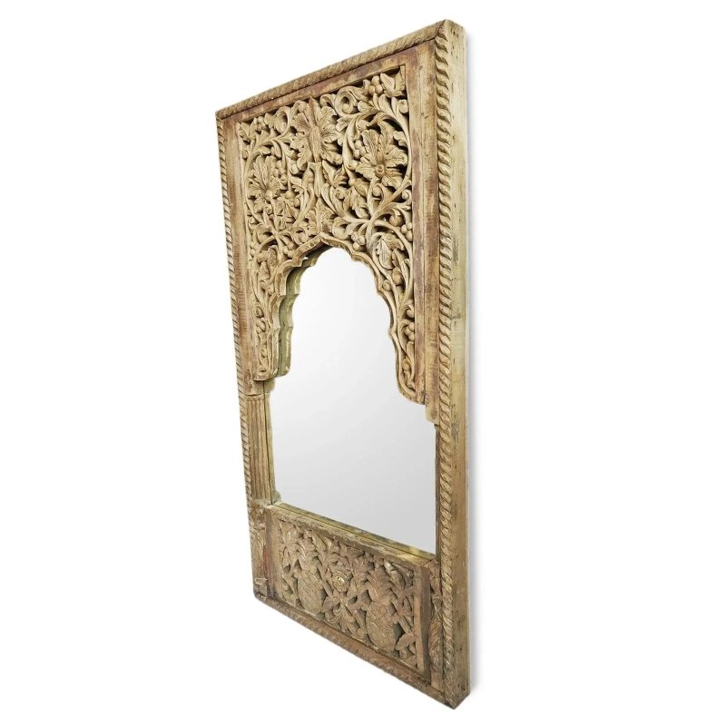 Arched wood accent mirror in a rustic finish, side profile view revealing frame depth, carved vines and rope edging.