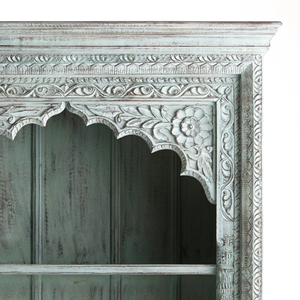 Arched wood shelving unit in a rustic finish, corner detail view showing the upper right flower and carved trim.