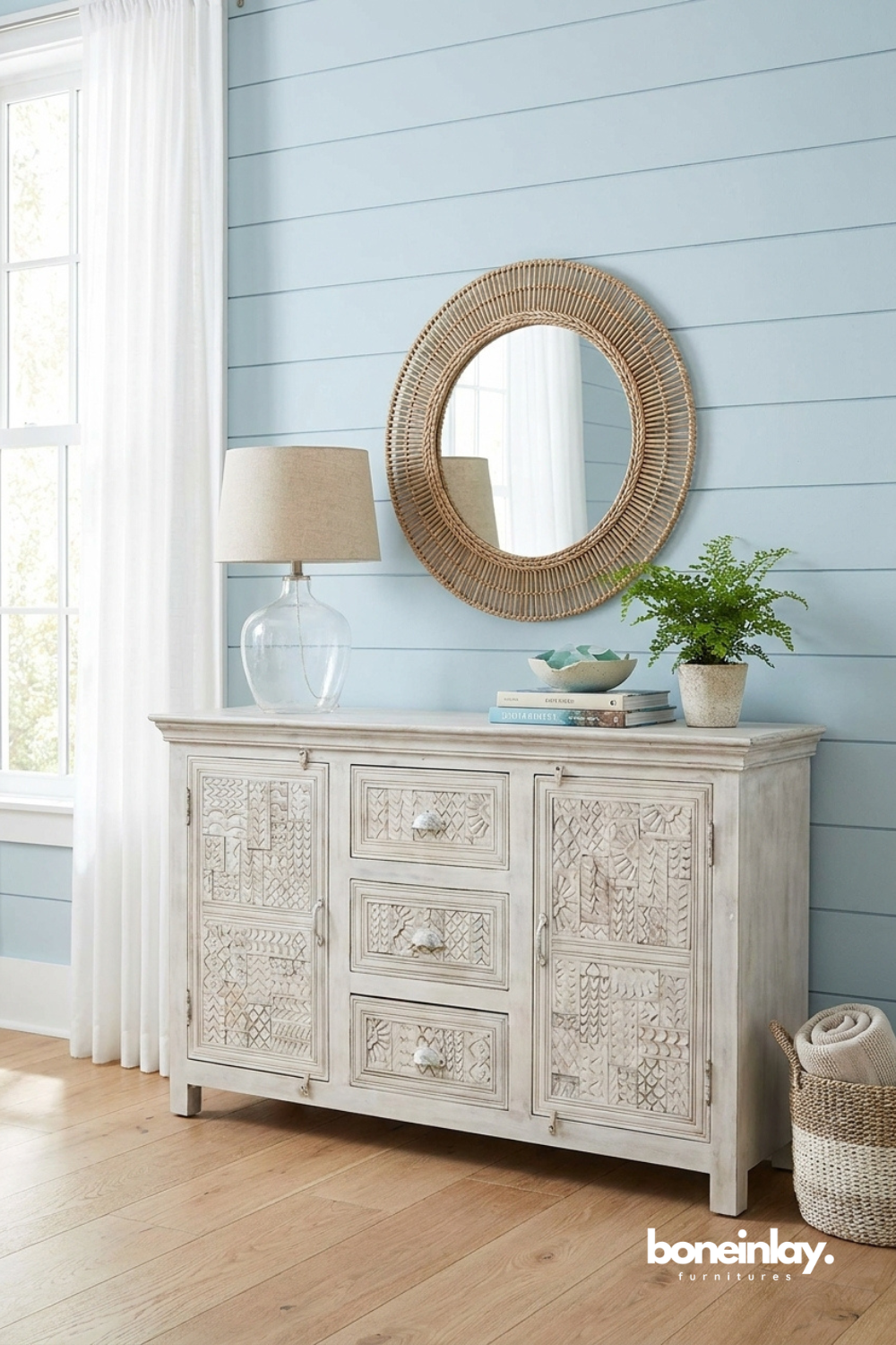 Distressed white carved sideboard blending coastal charm with beautifully textured artisan detailing.