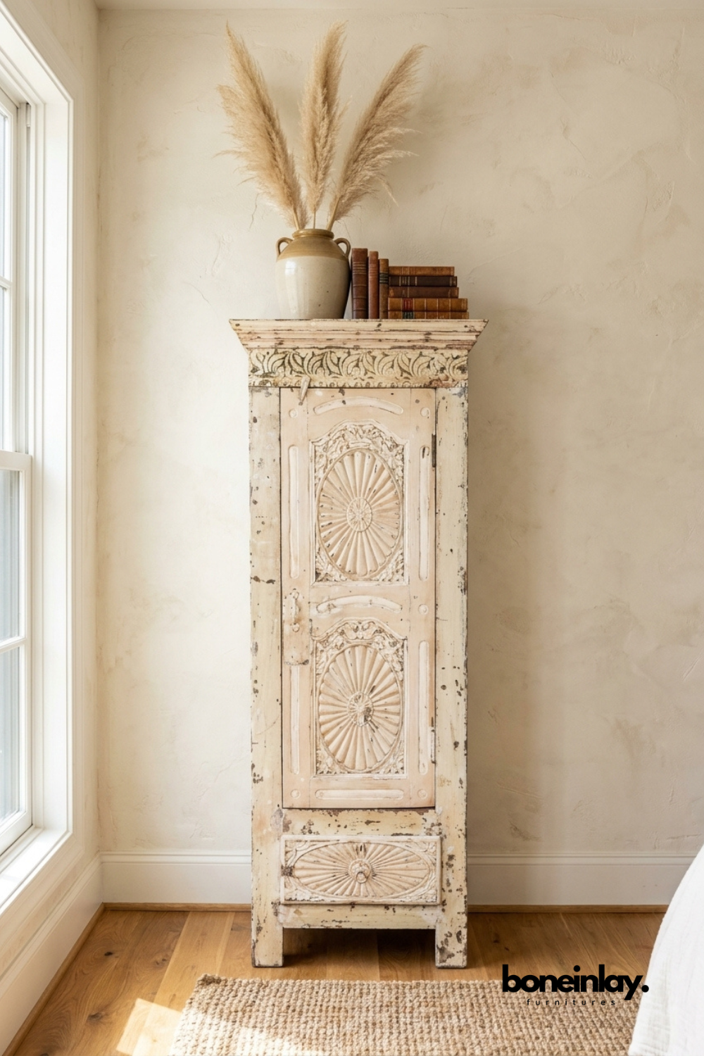 Handcrafted distressed solid wood tall cabinet featuring carved sunburst door panels, vintage finish, single door storage, and rustic accent cabinet for bedroom or living room.