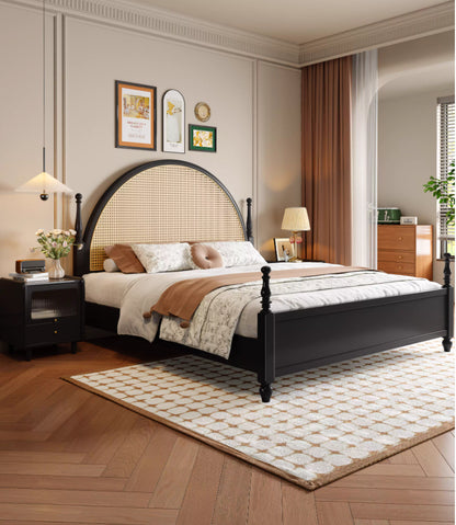 Atom modern black solid wood platform bed frame with large arched natural woven rattan cane headboard in a styled bedroom