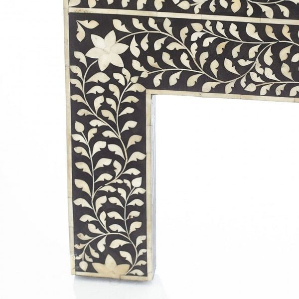 Black bone inlay Mehrab headboard showing detailed floral vine and lotus motif crafted on mango wood frame