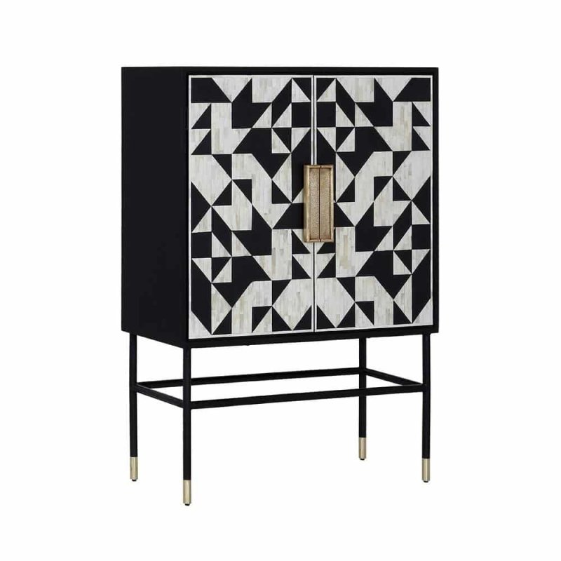Angled view of black and white bone inlay 2-door bar cabinet with geometric triangle pattern, sleek black iron frame, gold-tipped legs, and antique brass center handle