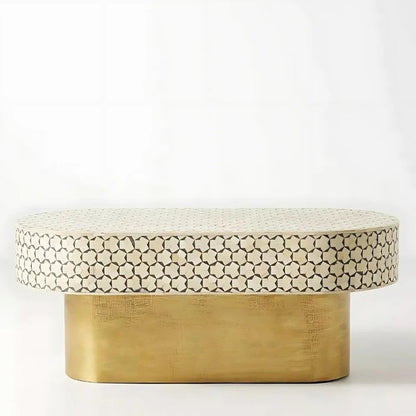 White bone inlay oval tea table with geometric star pattern and brass base, angled side view showing the recessed base