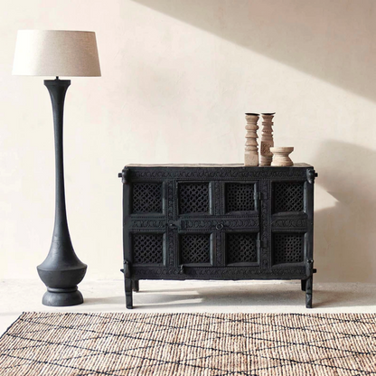 Hand-carved solid wood Indian Damchiya cabinet with Jali lattice panels and iron hardware in distressed matte black finish.