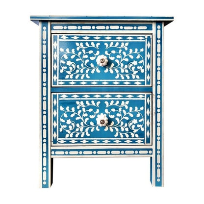 A handcrafted two-drawer bone inlay nightstand in deep blue with intricate white floral patterns and ceramic knobs.