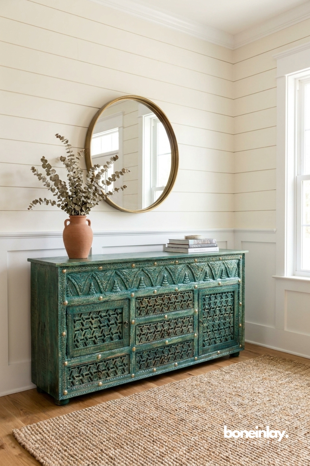 Vintage turquoise cabinet highlighted by geometric lattice carvings and rich handcrafted character.