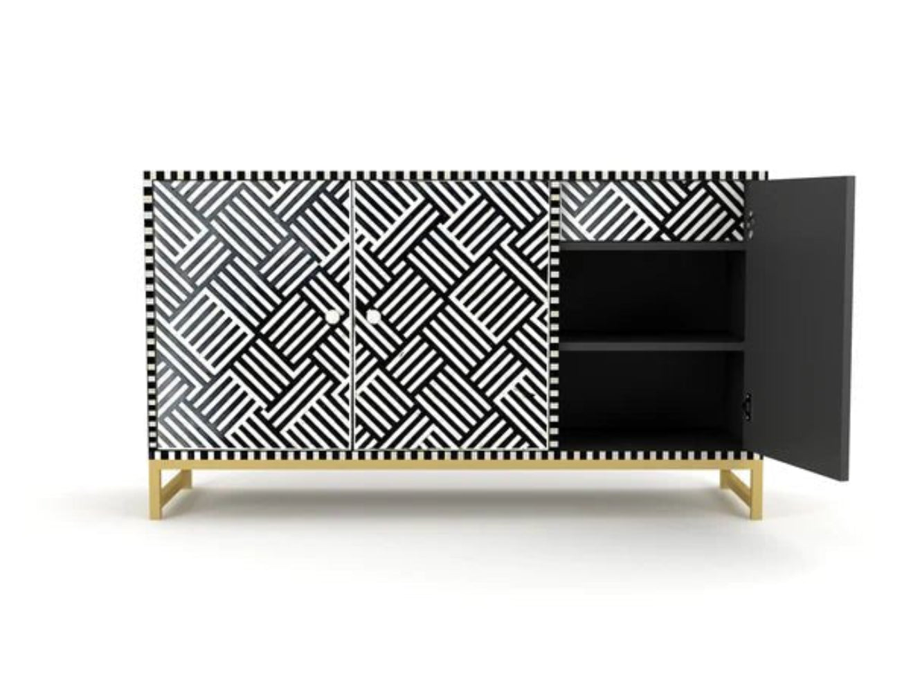 Bone inlay black and white credenza cabinet with right door open revealing interior shelf, geometric pattern doors and brass base on white background