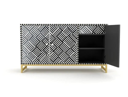 Bone inlay black and white credenza cabinet with right door open revealing interior shelf, geometric pattern doors and brass base on white background