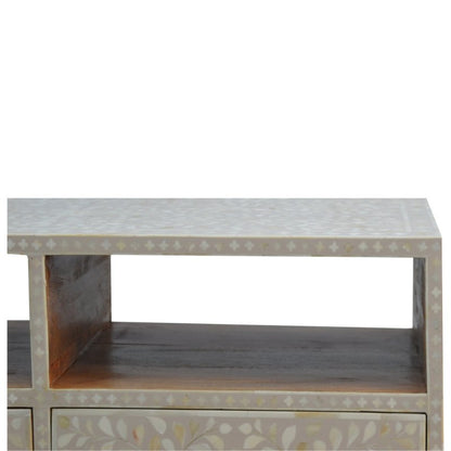 Bone inlay media credenza in white with all-over floral pattern, two open storage bays, double drawers with round knobs, mango wood legs.