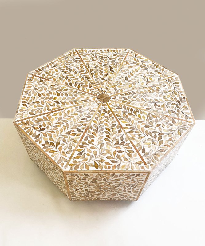 Bone inlay octagonal table with dense leaf mosaic pattern radiating from a central brass medallion, showing full surface coverage in ivory and golden tones on white background