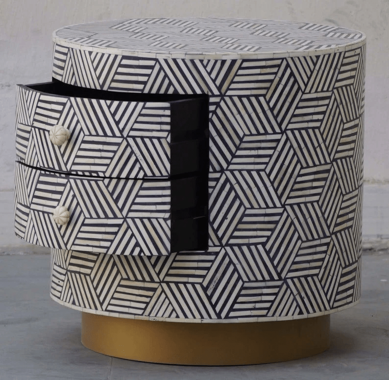 Round bone inlay bedside cabinet showing open drawer interior, geometric hexagonal inlay pattern, and gold base