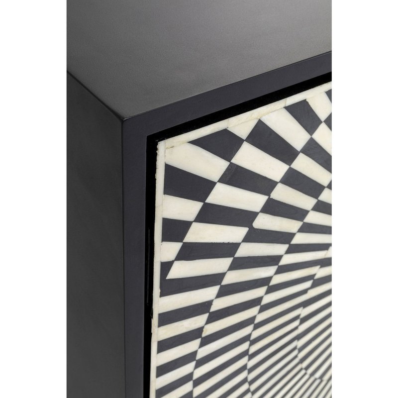 Top corner detail of black wooden frame on bone inlay starburst sideboard, showing wavy optical illusion black and white inlay door panel craftsmanship