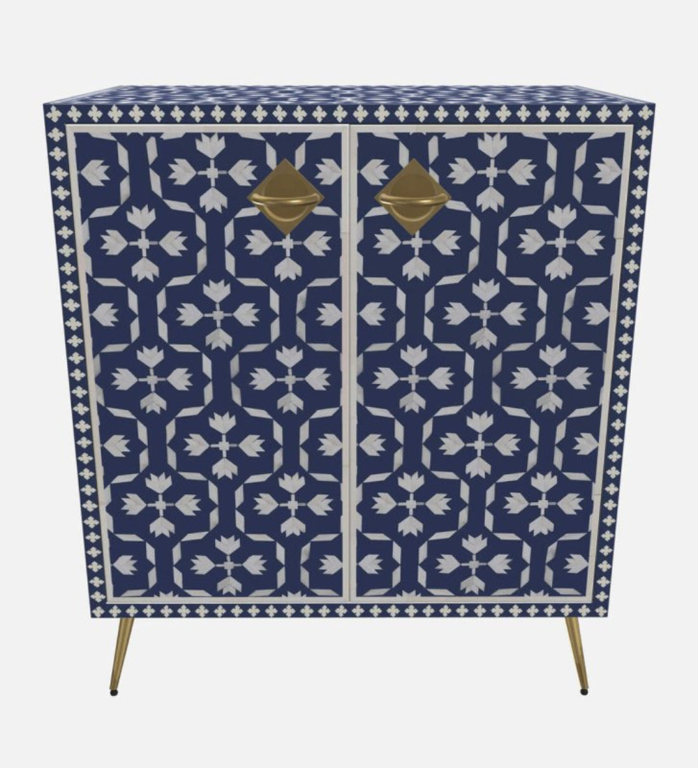 Bone inlay two-door cabinet in navy indigo with white tulip motif, brass diamond pulls and tapered legs