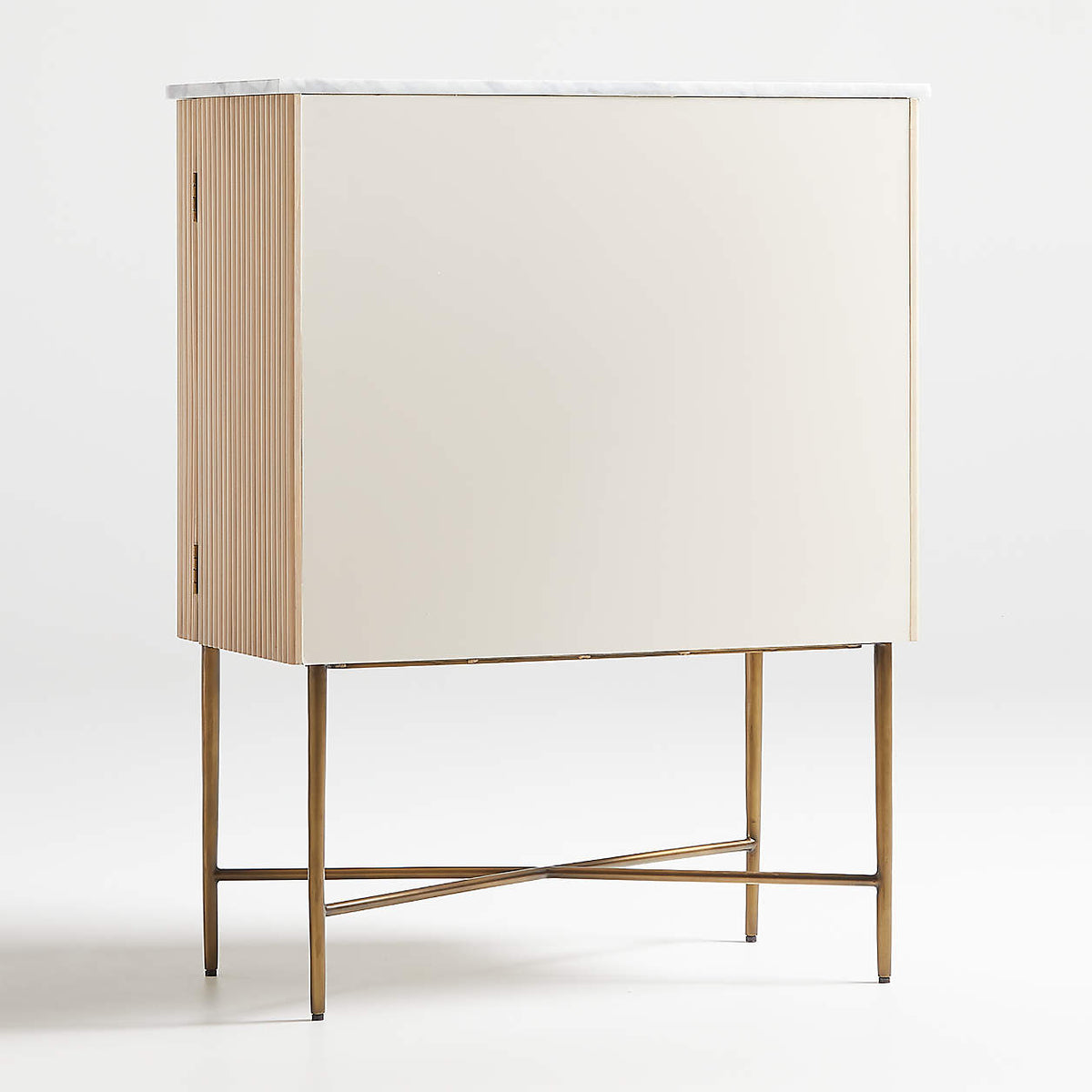 Brass base drinks cabinet in a back view, showing the flat side panel next to the fluted front edge.