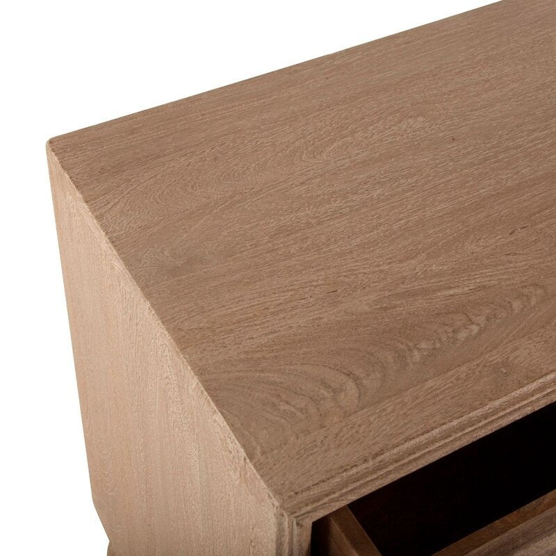 Carved Floral Nightstand showing a close view of the light natural wood surface and decorative floral scrollwork