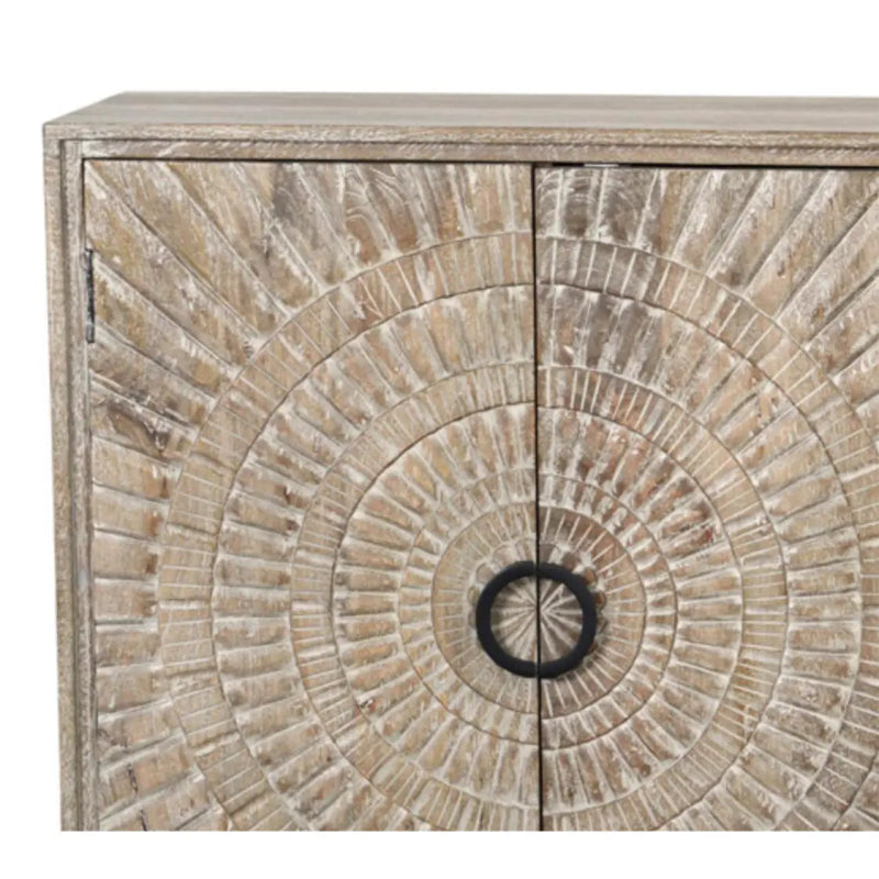 Carved wood credenza with a pale washed finish, zoomed-in view of the door medallions and ring pulls.