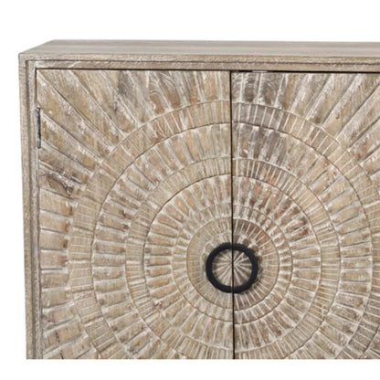 Carved wood credenza with a pale washed finish, zoomed-in view of the door medallions and ring pulls.