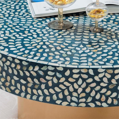 Circular white and blue bone inlay coffee table with brushed brass base, artisan crafted luxury furniture