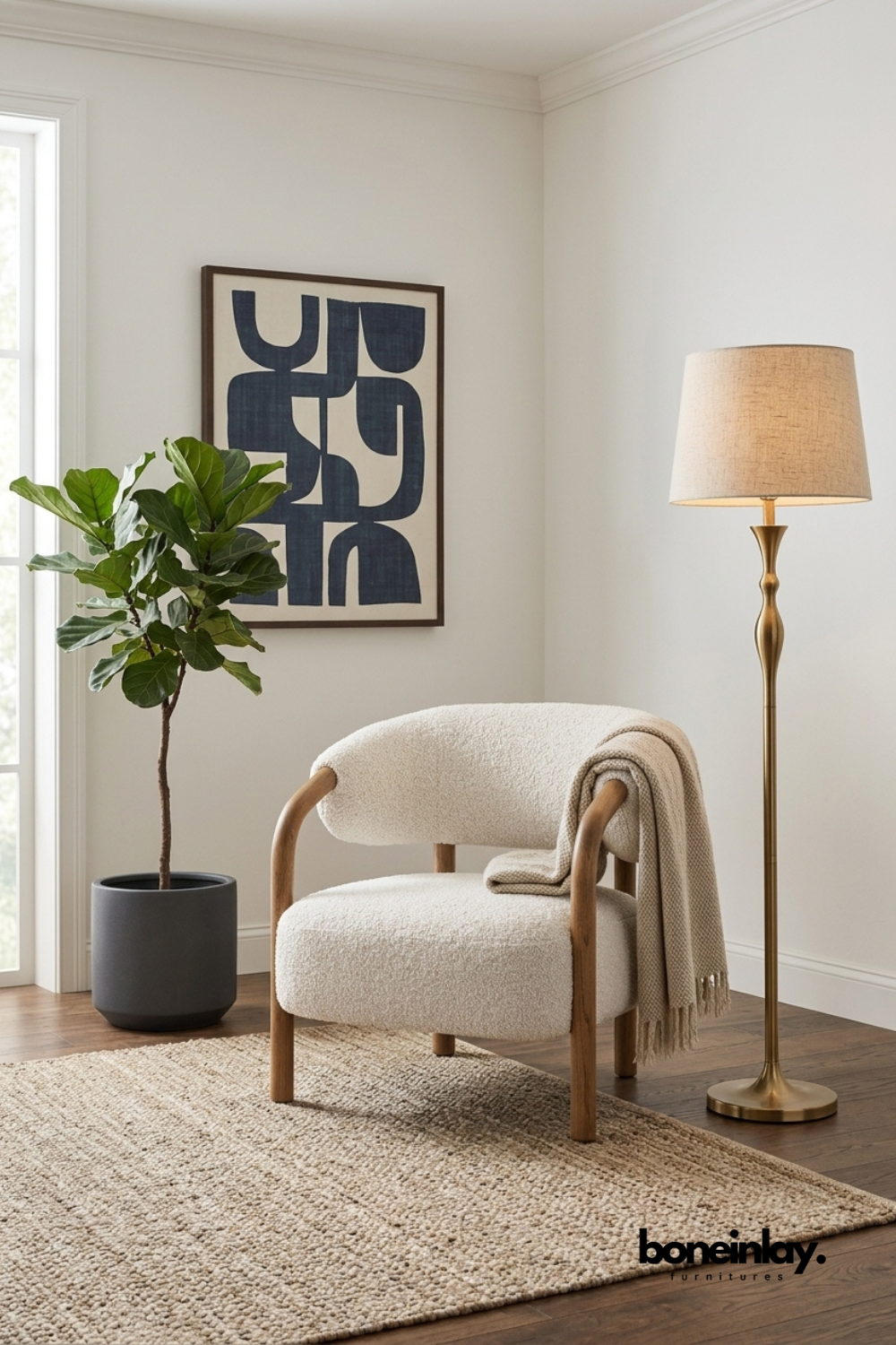 Contemporary boucle lounge chair with rounded backrest, solid wood frame, and textured white upholstery for modern living room seating.