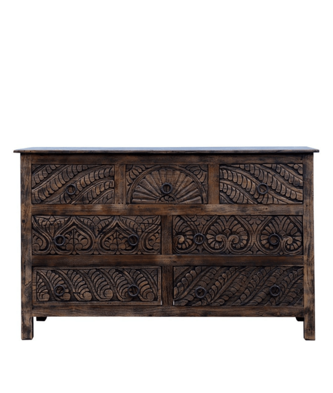 Carved dresser in dark wood, with a broad top above three small drawers and four larger storage drawers.