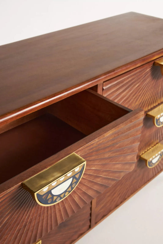 Daybreak Six Drawer Lowboy in walnut wood is shown from above with one drawer open, exposing the dark storage interior.
