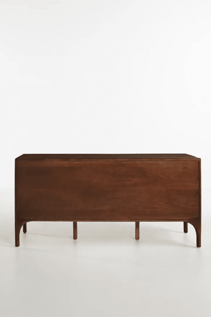 Daybreak Storage Bureau in brown hardwood, shown in a back view with its plain rear panel and supporting legs.