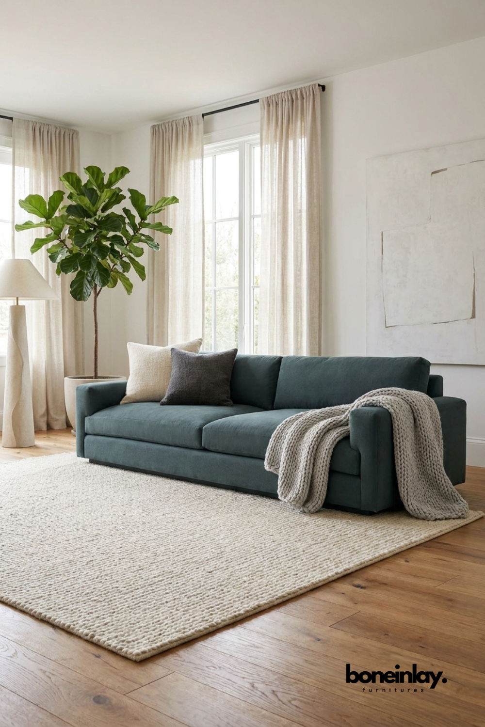 Mid-century style curule or bench sofa upholstered in rich mustard yellow velvet with prominent cylindrical armrests and a dark wood exposed base frame, set against a warm-toned living room background.