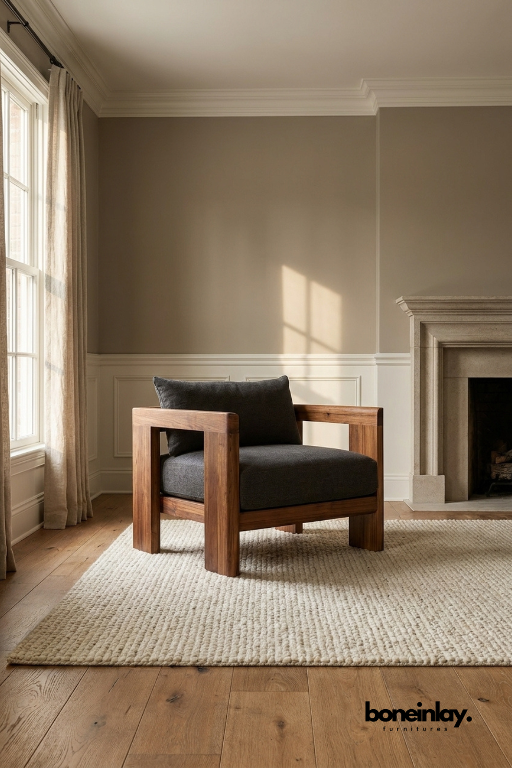 Modern walnut wood lounge chair with charcoal upholstered cushion, contemporary accent chair featuring bold geometric wooden arms and minimalist design.