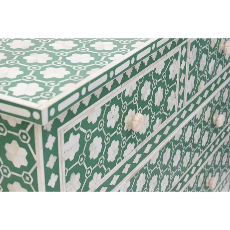 Close detail of emerald green bone inlay dresser top surface and upper drawer fronts showing intricate ivory floral and hexagon inlay work